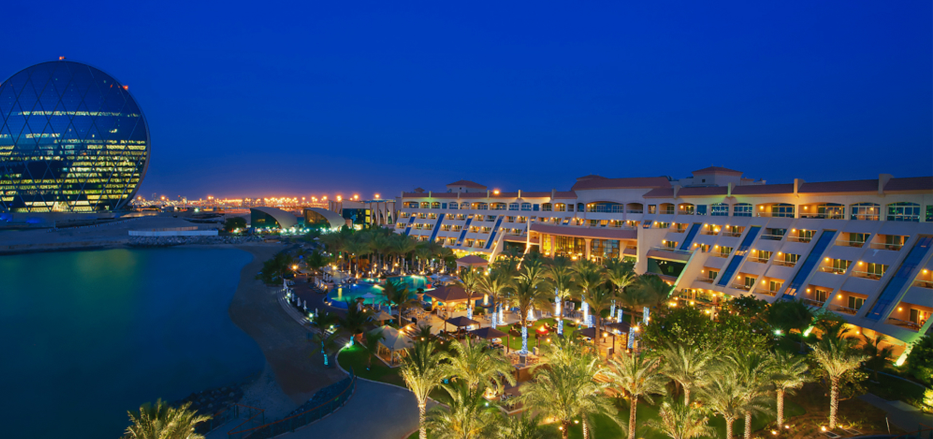 Residential buildings facing the marina and promenade