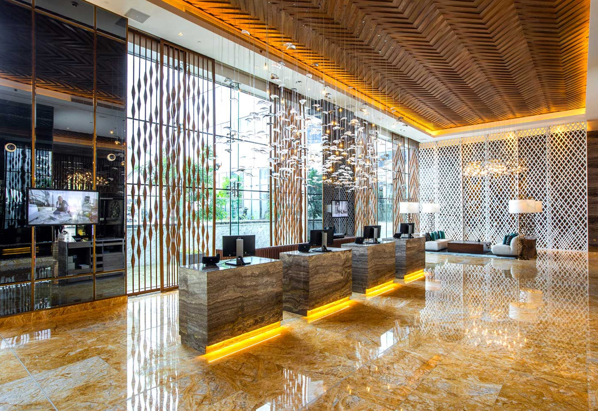 Guest rooms and suites at Rotana Jaddaf